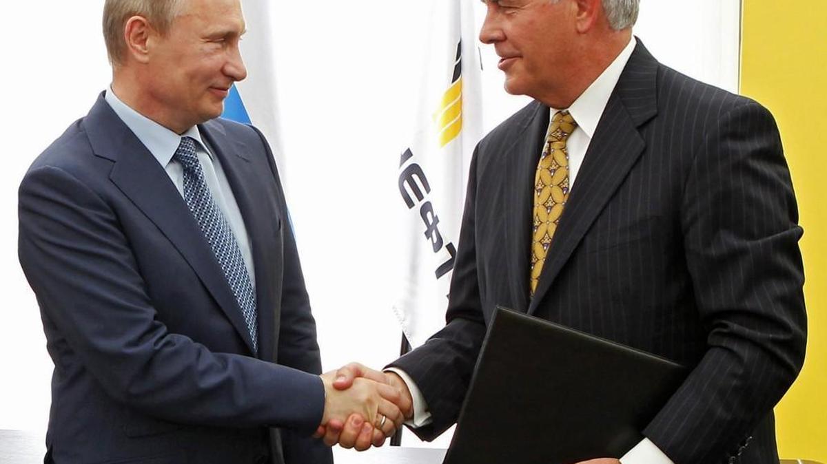 Russian President Vladimir Putin (left) and Exxon Mobil Corp. CEO Rex Tillerson shook hands after signing an agreement between Exxon Mobil and the state-controlled Russian oil company Rosneft in June 2012 in Tuapse, Russia. President-elect Donald Trump is widely expected to be nominate Tillerson to be his secretary of state.