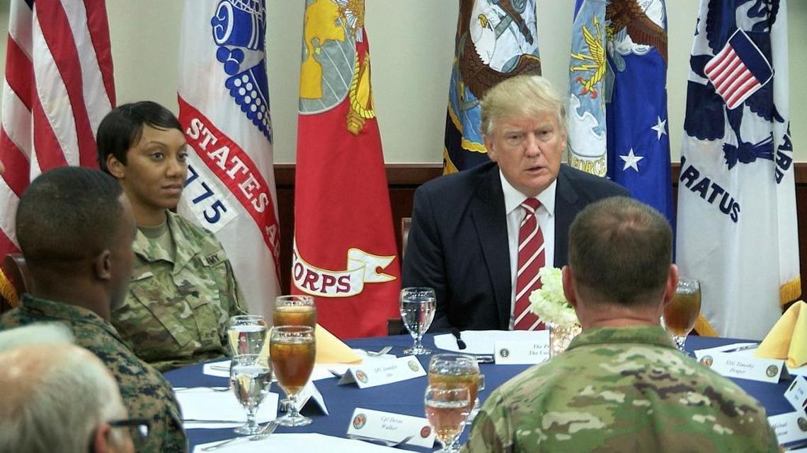 President Donald Trump talks with members of the military during a luncheon at U.S. Central Command at MacDill Air Force Base, Fla., on Monday, Feb. 6, 2017.