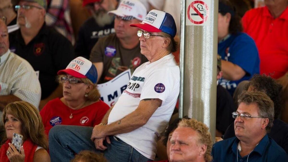 Supporters of Republican presidential candidate Donald Trump listen he speaks during a campaign rally, Wednesday, Oct. 12, 2016, in Ocala, Fla.