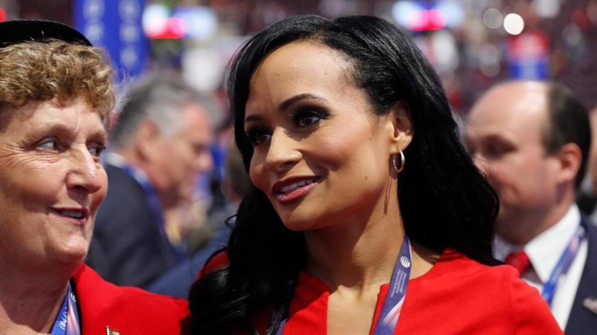 Katrina Pierson, right, talks with delegates on the convention floor during the final day of the Republican National Convention. Pierson recently was spotted at Trump Tower and could be Donald Trump’s press secretary.