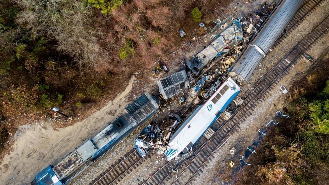 An aerial view of the site of an early morning train crash on Feb. 4 between an Amtrak train, bottom right, and a CSX freight train, top left, in Cayce, SC. The Amtrak passenger train slammed into a freight train in the early morning darkness Sunday, killing at least two Amtrak crew members and injuring more than 110 people, authorities said.