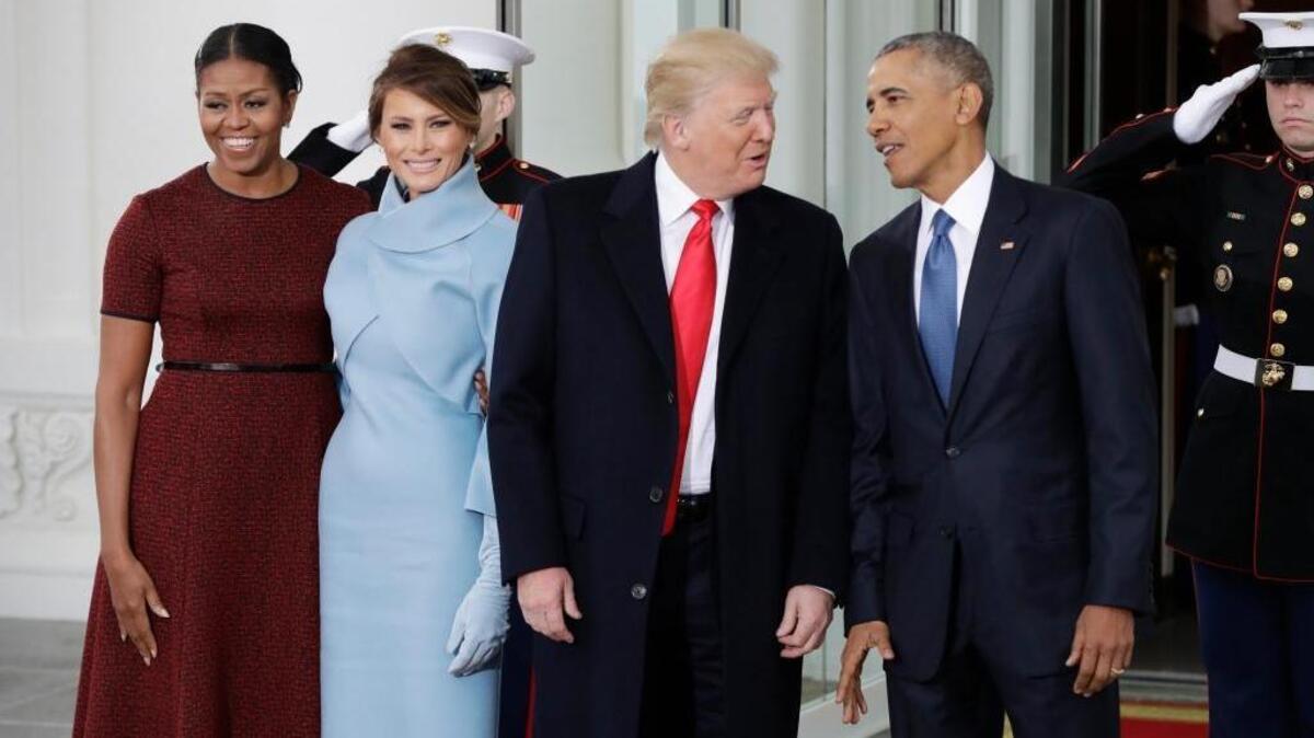 President Barack Obama and first lady Michelle Obama pose with President-elect Donald Trump and his wife, Melania, at the White House in Washington, Friday, Jan. 20, 2017.