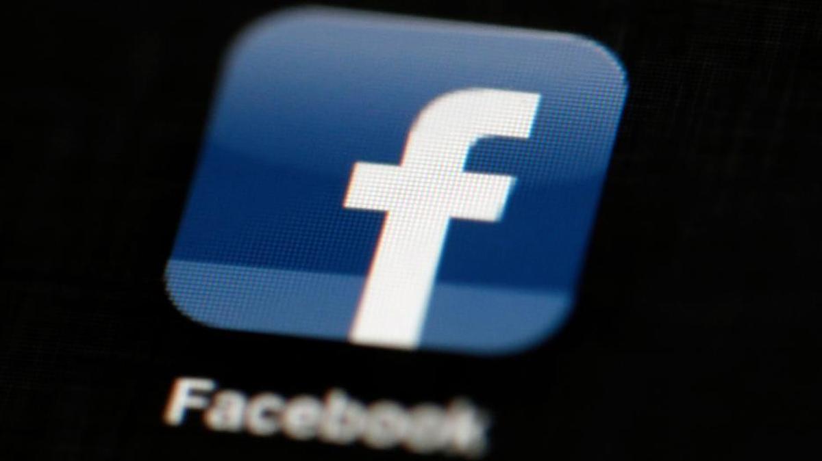 FILE - In this May 16, 2012, file photo, the Facebook logo is displayed on an iPad in Philadelphia.