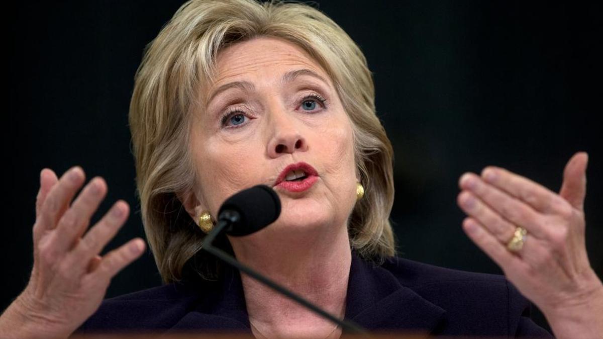 FILE - In this Oct. 22, 2015 file photo, Democratic presidential candidate former Secretary of State Hillary Rodham Clinton testifies on Capitol Hill in Washington before the House Select Committee on Benghazi. Clinton never personally denied any requests from diplomats for additional security at the U.S. outpost in Benghazi, Libya, according to Democrats on a select House panel who absolved the former secretary of state and the U.S. military of wrongdoing in the deadly Sept. 11, 2012 attacks.