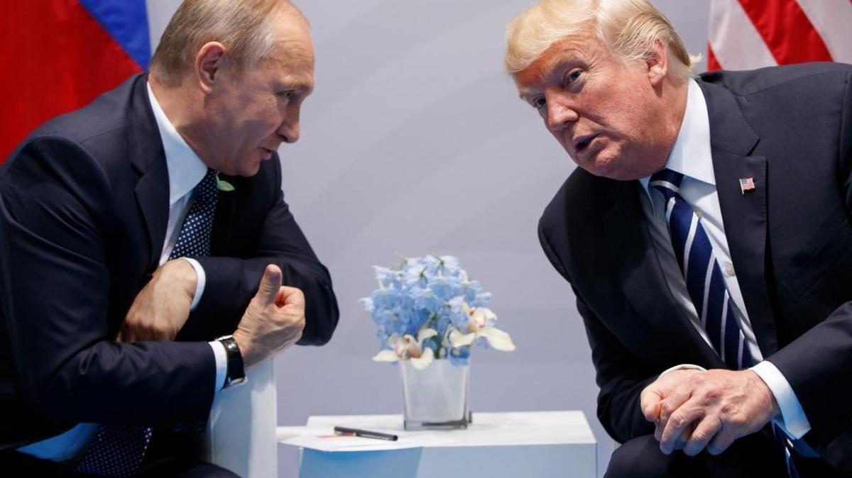 In this Friday, July 7, 2017, file photo U.S. President Donald Trump meets with Russian President Vladimir Putin at the G-20 Summit in Hamburg.