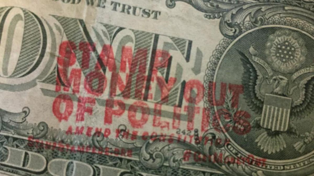 Stamping political messages on money is legal, according to the non-profit that sells the stamps. StampStampede.org’s president is Ben Cohen, co-founder of Ben & Jerry’s Ice Cream.