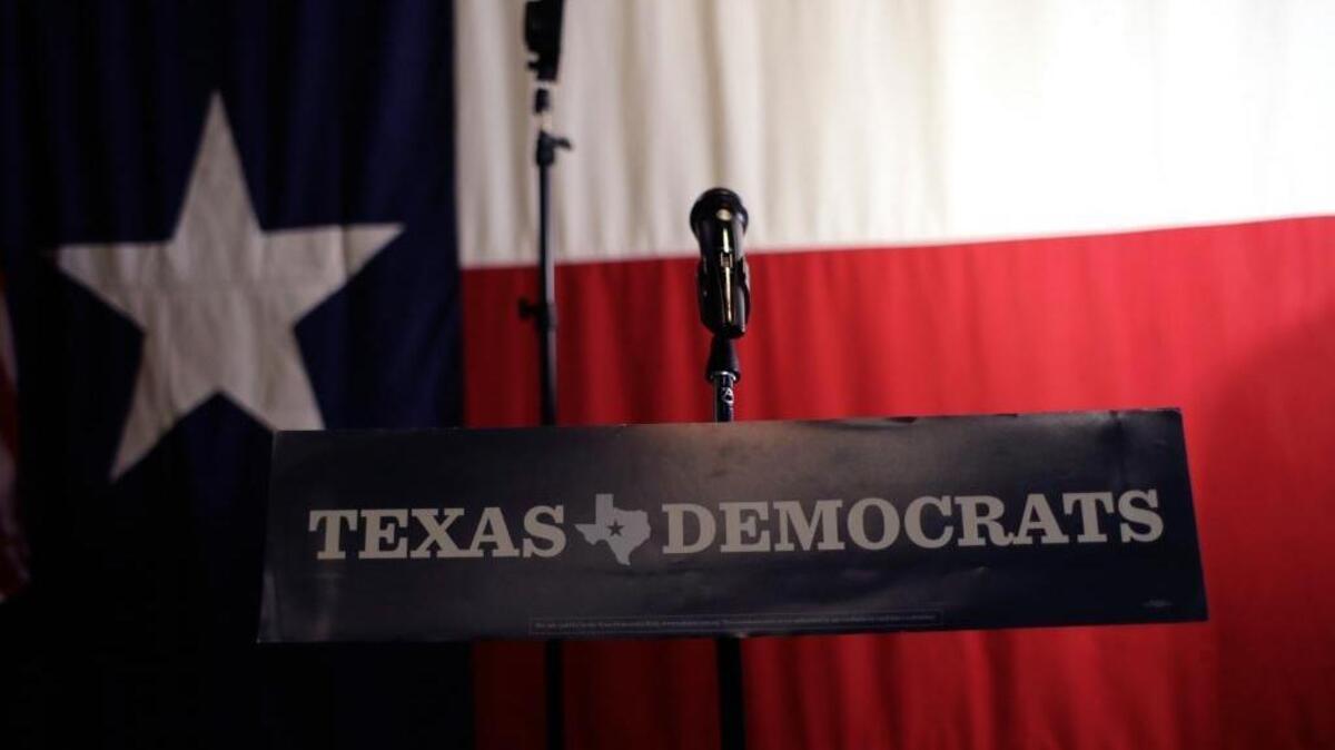 A Texas Democrats sign hangs on a podium at a Democratic watch party following the Texas primary election last week.