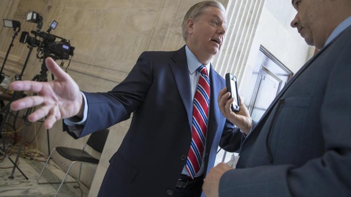 Sen. Lindsey Graham, R-S.C., chairman of the Senate Judiciary Subcommittee on Crime and Terrorism, reacts to questions on the firing of FBI Director James Comey by President Donald Trump on Capitol Hill in Washington, early Wednesday, May 10, 2017.
