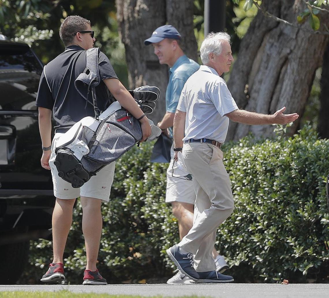 Former NFL football quarterback Peyton Manning, center, and Sen. Bob Corker, R-Tenn., right, on the South Lawn of the White House, June 4, 2017. Corker and Manning were in President Donald Trump's motorcade which was returning from Trump National Golf Club in Sterling, Va. The president ate lunch in the club dining room with Manning and Corker. It’s one of the places where the fake Time magazine cover is hanging.