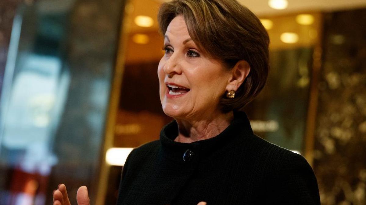 Lockheed Martin CEO Marillyn Hewson talks to reporters in the lobby of Trump Tower in New York, Friday, Jan. 13, 2017, after a meeting with President-elect Donald Trump.