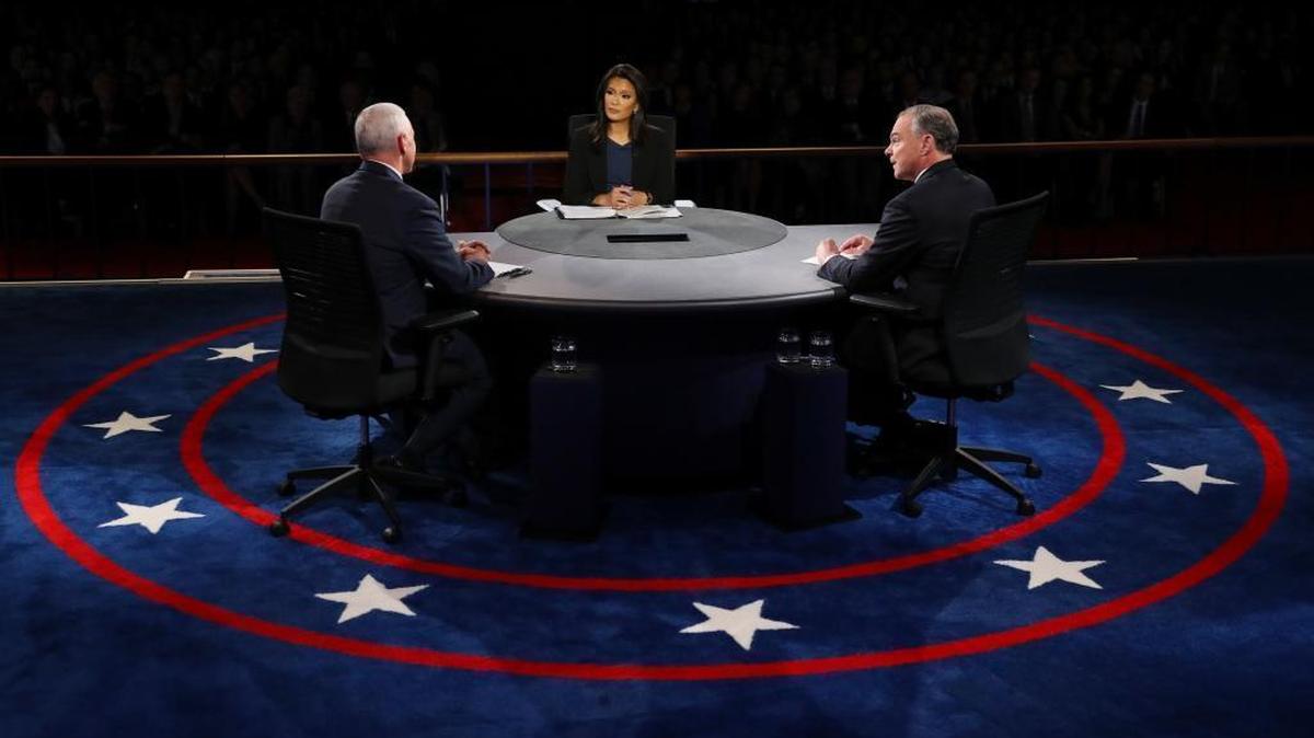 Republican vice-presidential nominee Gov. Mike Pence and Democratic vice-presidential nominee Sen. Tim Kaine discuss a question during the vice-presidential debate at Longwood University in Farmville, Va., Tuesday, Oct. 4, 2016.