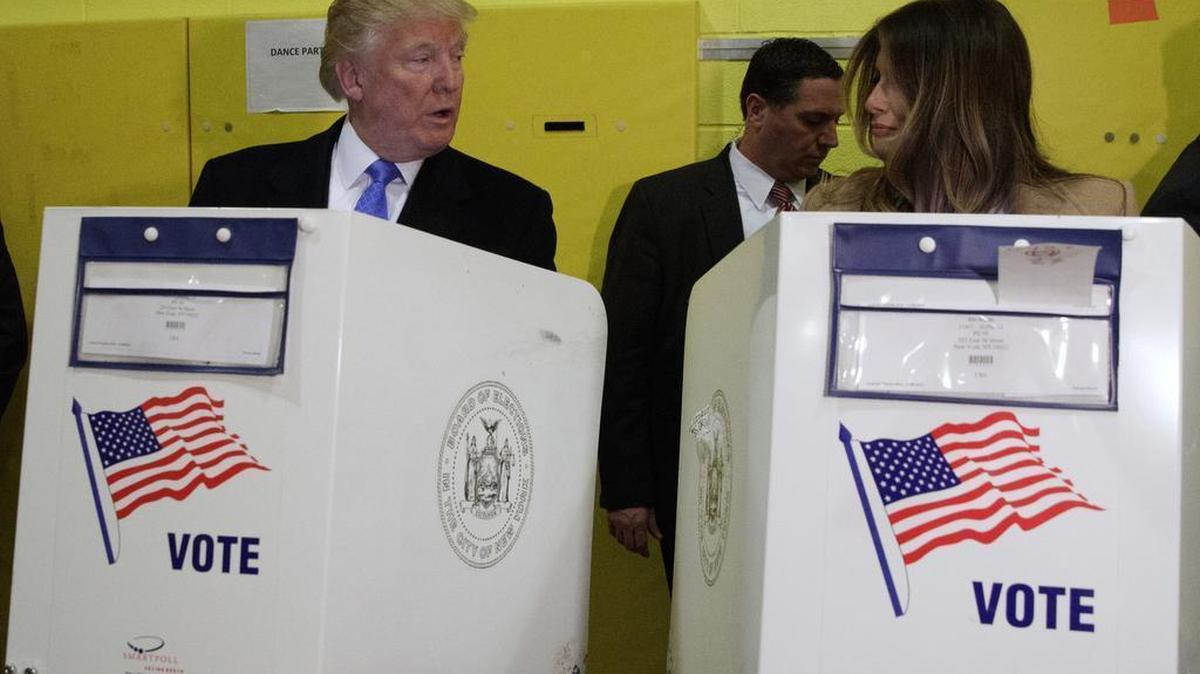 Republican presidential candidate Donald Trump and his wife, Melania, cast their ballots Tuesday, Nov. 8, 2016, in New York.