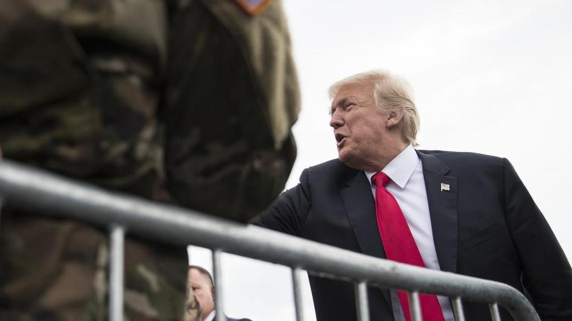 President Donald Trump greats members of the military and others as he arrives on Air Force One at Raleigh County Memorial Airport, in Beaver, W.Va., Monday, July 24, 2017, en route to the 2017 National Scout Jamboree in Glen Jean, W.Va..