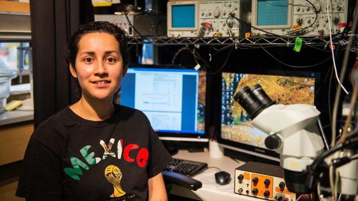 Yuriana Aguilar, 26, of Fresno, then a Quantitative Systems Biology program Ph.D. student at the University of California, Merced, poses for a photo inside her lab at UC Merced, May 12, 2016.