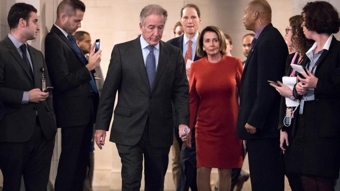 From left at center, Rep. Richard Neal, D-Mass., the ranking member of the House Ways and Means Committee, Sen. Ron Wyden, D-Ore., the ranking member of the Senate Finance Committee, and House Minority Leader Nancy Pelosi, D-Calif., arrive for a news conference to criticize the Republican tax reform being debated in Congress.