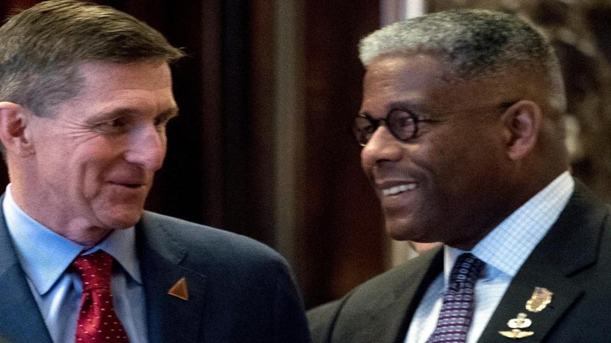 Michael Flynn, President-elect Donald Trump's nominee for National Security adviser, left, speaks with former Rep. Allen West, R-Fla., right, at Trump Tower, Monday, Dec. 5, 2016, in New York.
