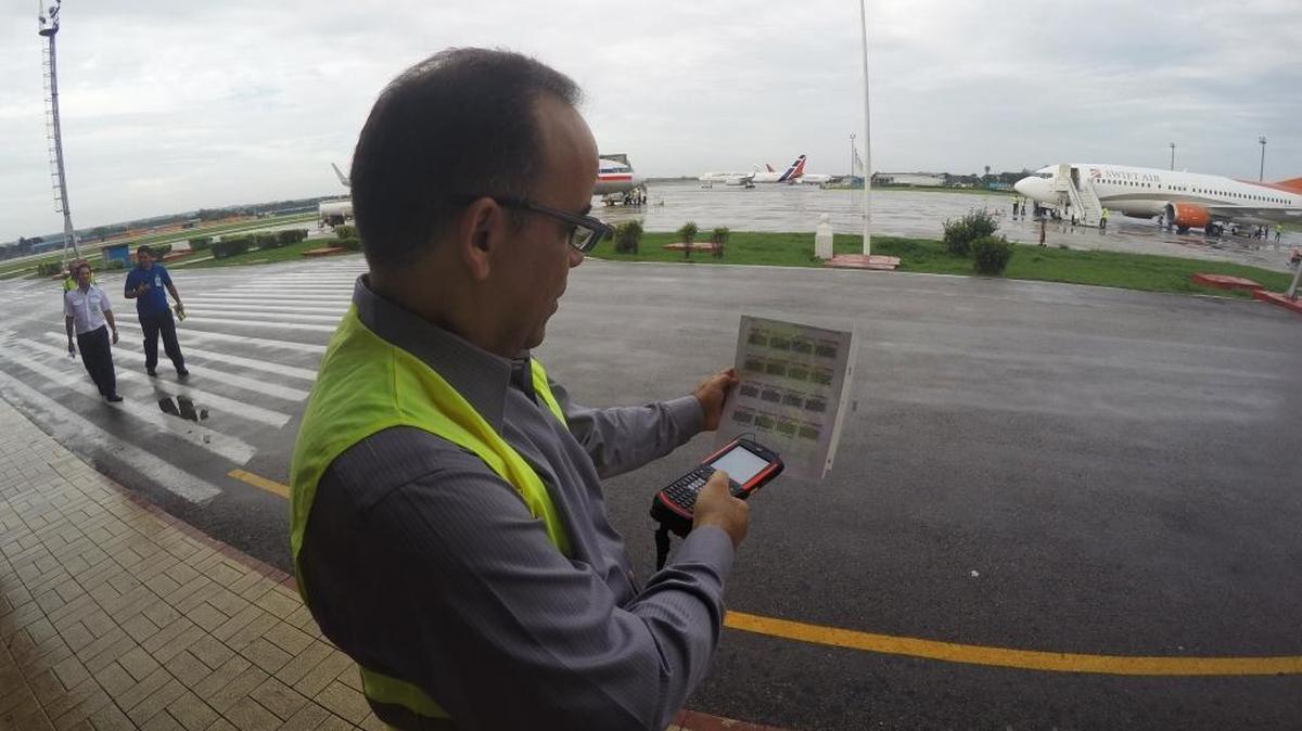 Galo Beltran, Cuba country manager for American Airlines, tested a handheld baggage scanner at Havana’s Jose Marti International Airport on Thursday. Friday, the U.S. government authorized six U.S. airlines to serve nine Cuban cities, but Havana, with major infrastructure woes, was not among them.