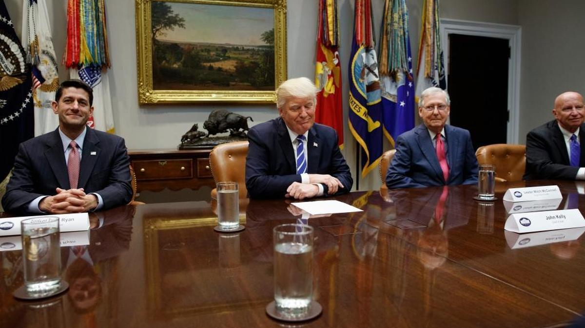 President Donald Trump pauses during a meeting with Congressional leaders and administration officials on tax reform, in the Roosevelt Room of the White House, Tuesday, Sept. 5, 2017, in Washington. From left, House Speaker Paul Ryan, R-Wis., Trump, Senate Majority Leader Mitch McConnell, R-Ky., and Rep. Kevin Brady, R-Texas.