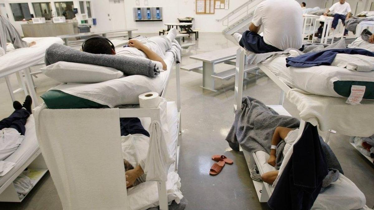 Detainees are shown resting on bunks inside the “B” cell and bunk unit of the Northwest Detention Center in Tacoma in this 2017 file photo.