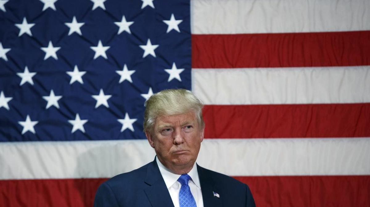 Republican presidential candidate Donald Trump listens to a question during a town hall, Thursday, Oct. 6, 2016, in Sandown, N.H.