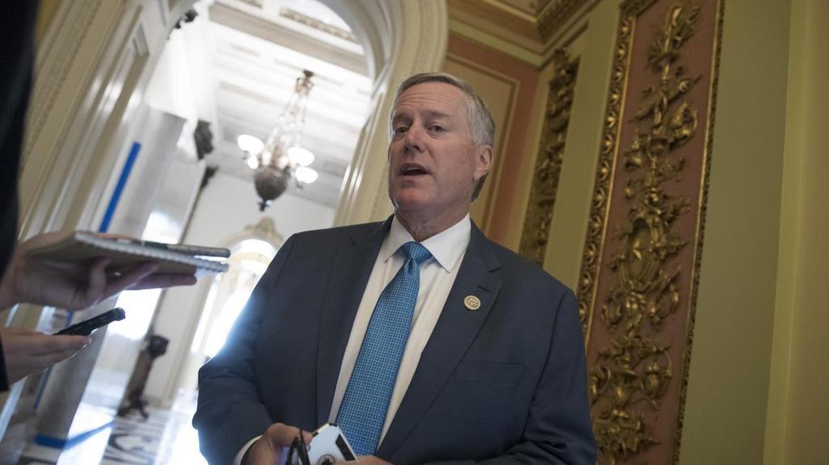 Rep. Mark Meadows, R-N.C., chairman of the conservative House Freedom Caucus, speaks with reporters as the House prepared to vote on relief for hurricane victims at the Capitol in Washington, Friday, Sept. 8, 2017.