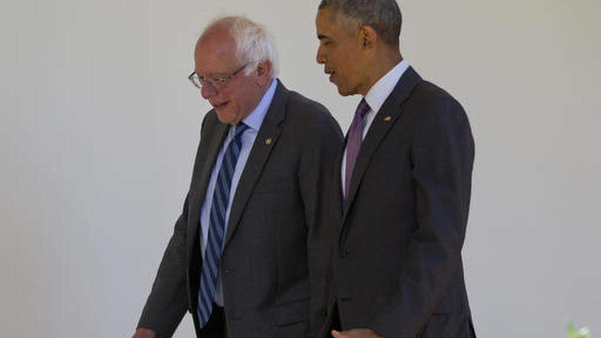 President Barack Obama walks with Democratic presidential candidate Sen. Bernie Sanders, I-Vt., down the Colonnade of the White House in Washington, Thursday, June 9, 2016.