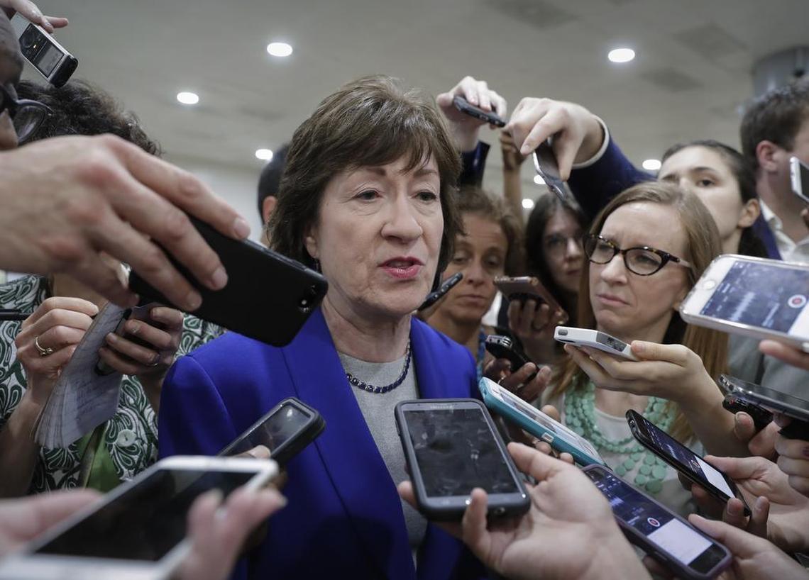 Sen. Susan Collins, R-Maine, speaks amid a crush of reporters after Republicans released their long-awaited bill to scuttle much of President Barack Obama’s Affordable Care Act, at the Capitol in Washington, Thursday, June 22, 2017. Collins says she is undecided on the bill..