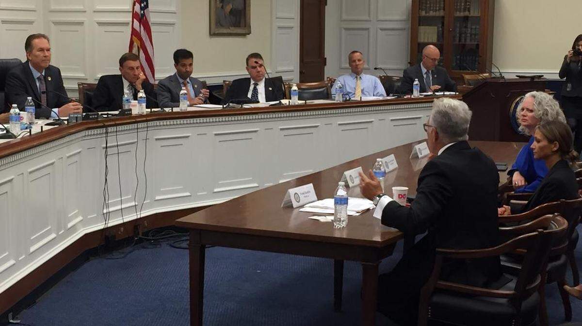 Florida delegation members listen to Frank C. Rabbito, senior vice president of WestCare Foundation during a public meeting on the heroin crisis.