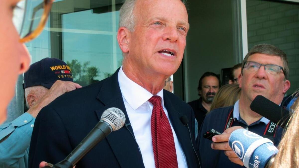 U.S. Sen. Jerry Moran, R-Kan., speaks to reporters following a town hall meeting, Thursday, July 6, 2017, in the tiny town of Palco, Kan. Moran is facing tough questions about GOP efforts to overhaul health care.