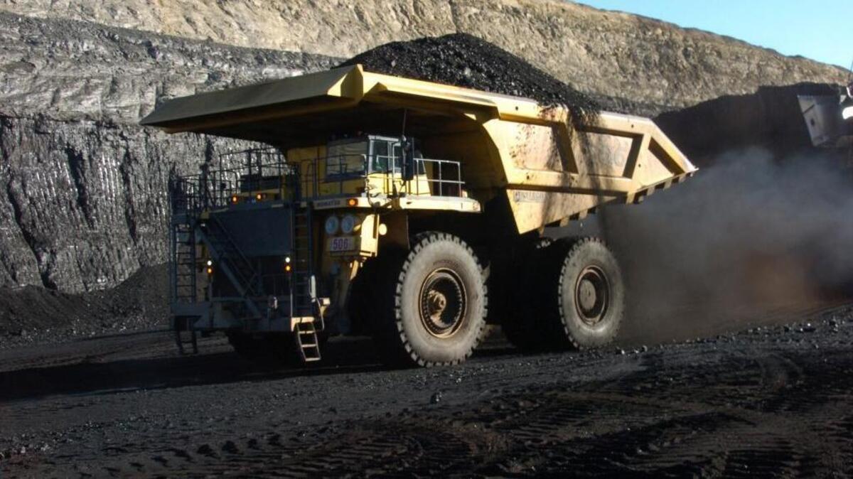 In this Nov. 15, 2016, photo, a haul truck with a 250-ton capacity carries coal from the Spring Creek strip mine near Decker, Mont. President-elect Donald Trump’s vow to revive coal country is met with measured hope in Appalachia and even out West, where mines stand to gain the most.