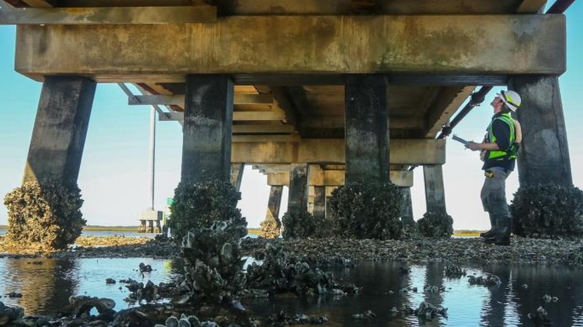 The President-elect campaigned on rebuilding America’s roads and bridges. Whether he can get his plan passed might have a lot to do with Congressional conservatives, such as those from South Carolina. Here, Keith Werner, with HDR Inc., inspects the Harbor River Bridge as part of an annual inspection that happened to coincide with Hurricane Matthew.