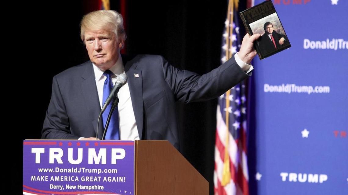 Republican presidential candidate Donald Trump, shown in August 2015, holds up a copy of his 1987 book, "Trump: The Art of the Deal" during a campaign event at Pinkerton Academy in Derry, N.H. Trump's first book was a memoir/manifesto dedicated to a life of big-time negotiating. Trump started his foundation in 1987 with a narrow purpose - to give away some of the proceeds from his book.