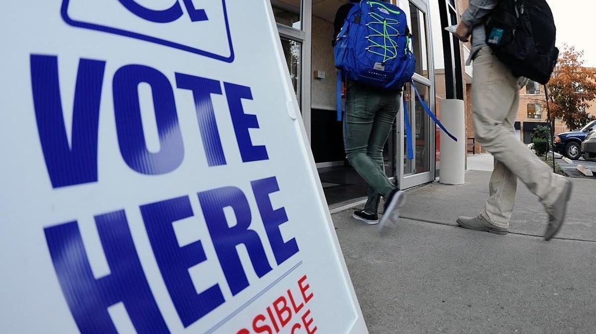 Voters arrive to vote at the B'Nai B'Rith Apartments polling location in Wilkes-Barre, Pa., Tuesday Nov. 8, 2016.