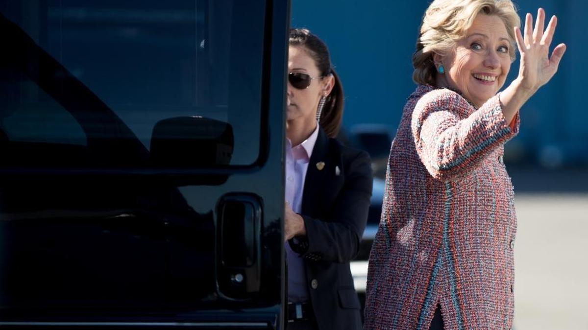 Democratic presidential candidate Hillary Clinton boards her campaign plane at Westchester County Airport in White Plains, N.Y., Tuesday, Oct. 11, 2016, to travel to Miami.