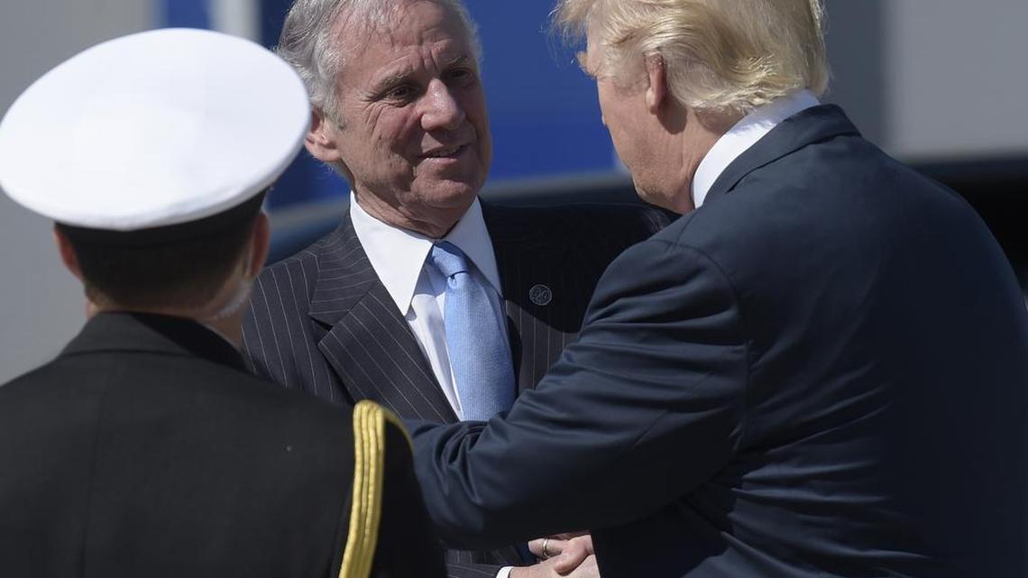 President Donald Trump shakes hands with South Carolina Gov. Henry McMaster after arriving on Air Force One at Charleston International Airport in North Charleston, S.C. in February.