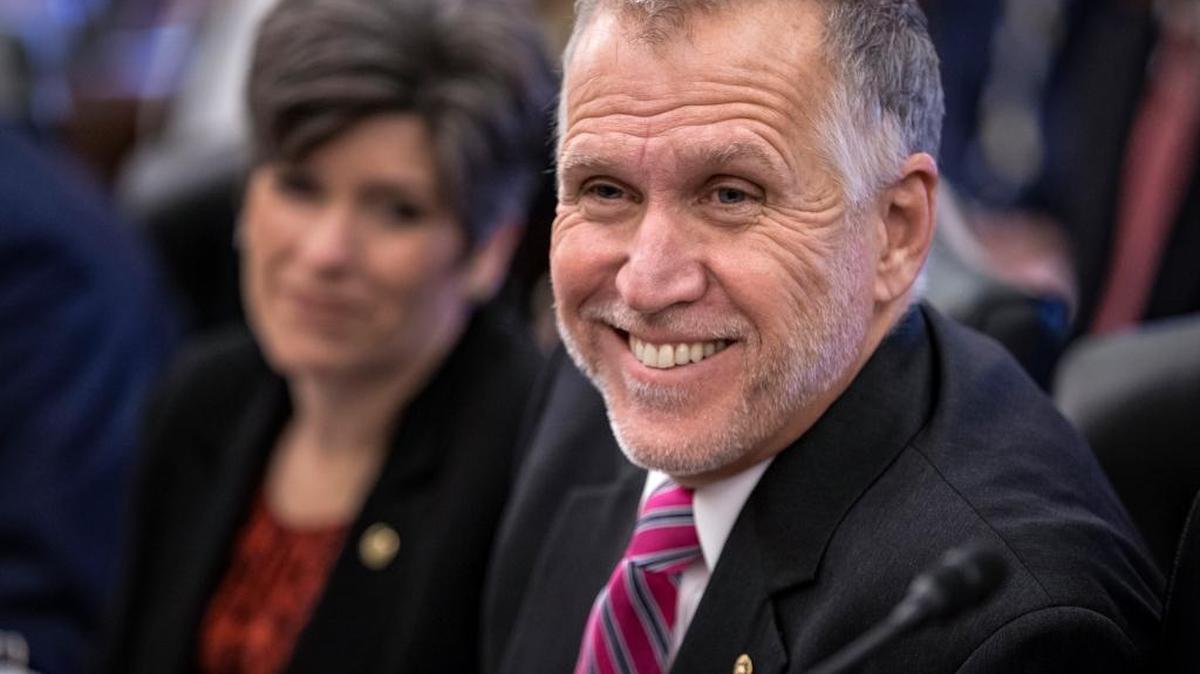 Senate Agriculture Committee members Sen. Thom Tillis, R-N.C., and Sen. Joni Ernst, R-Iowa, join other members of the committee on Capitol Hill in Washington, Jan. 20, 2016, as the panel approved new measures to set fat, sugar and sodium limits in school lunches.