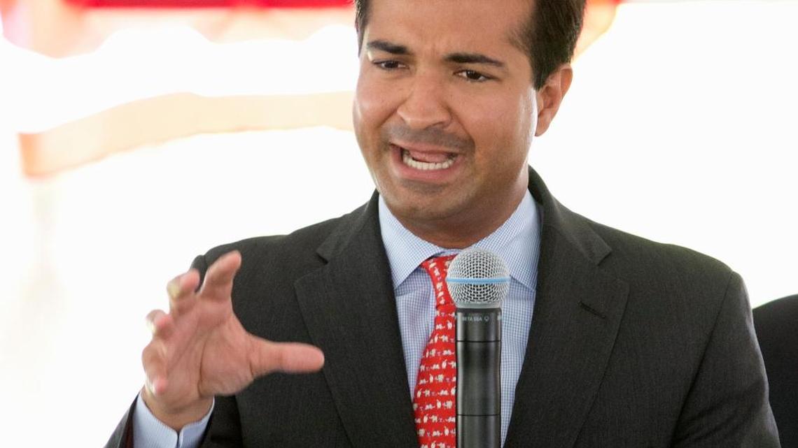 In this July 6, 2015 file photo, Rep. Carlos Curbelo, R-Fla. speaks in Miami. The Miami-area congressional seat held by Curbelo is one of the nation's most competitive, it ping-ponged between the GOP and the Democrats the last three elections.