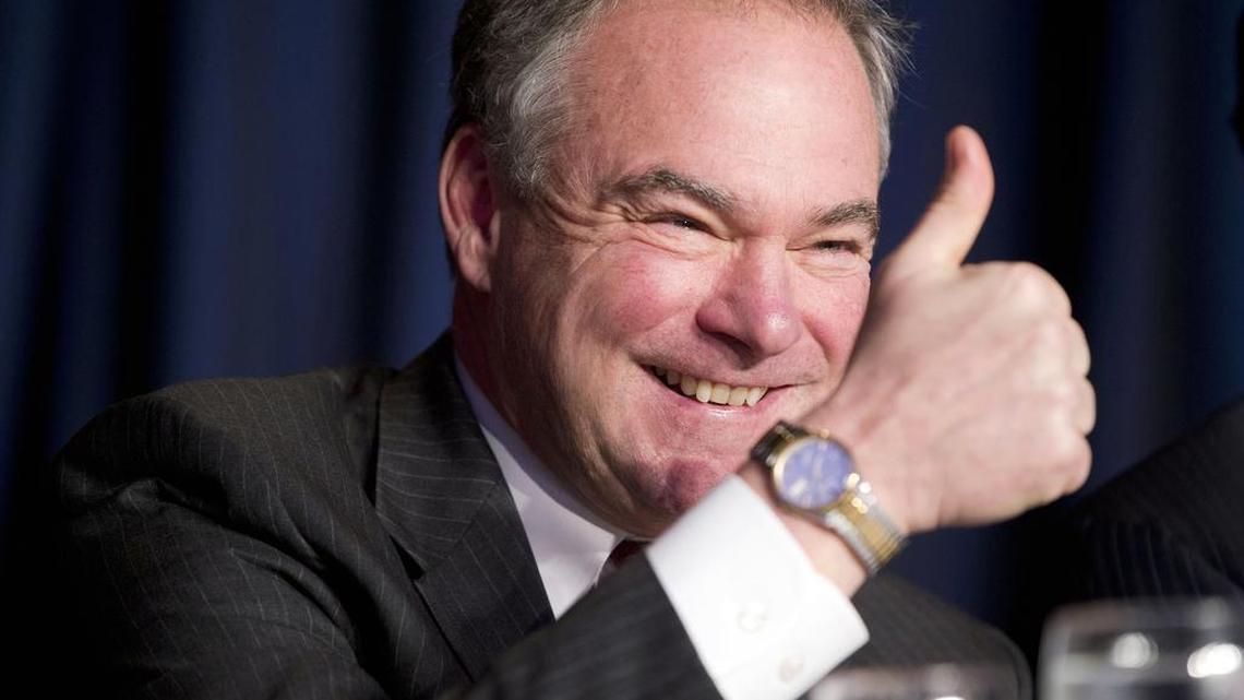 In this Feb. 4, 2016, file photo, Sen. Tim Kaine, D-Va., gives a 'thumbs-up' as he takes his seat at the head table for the National Prayer Breakfast in Washington. Kaine is one of several Democrats that Hillary Clinton is considering for her vice presidential running mate.