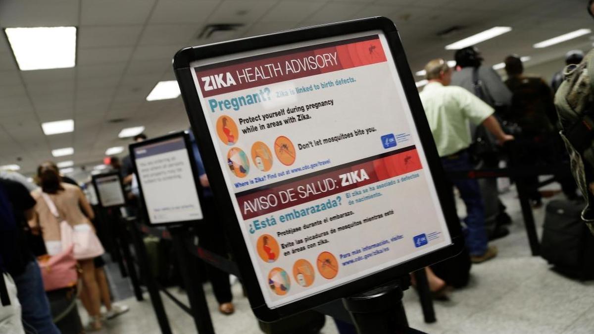 This sign at Hartsfield-Jackson Atlanta International Airport warns pregnant women to avoid being bitten by mosquitoes if they travel to areas with Zika infections.