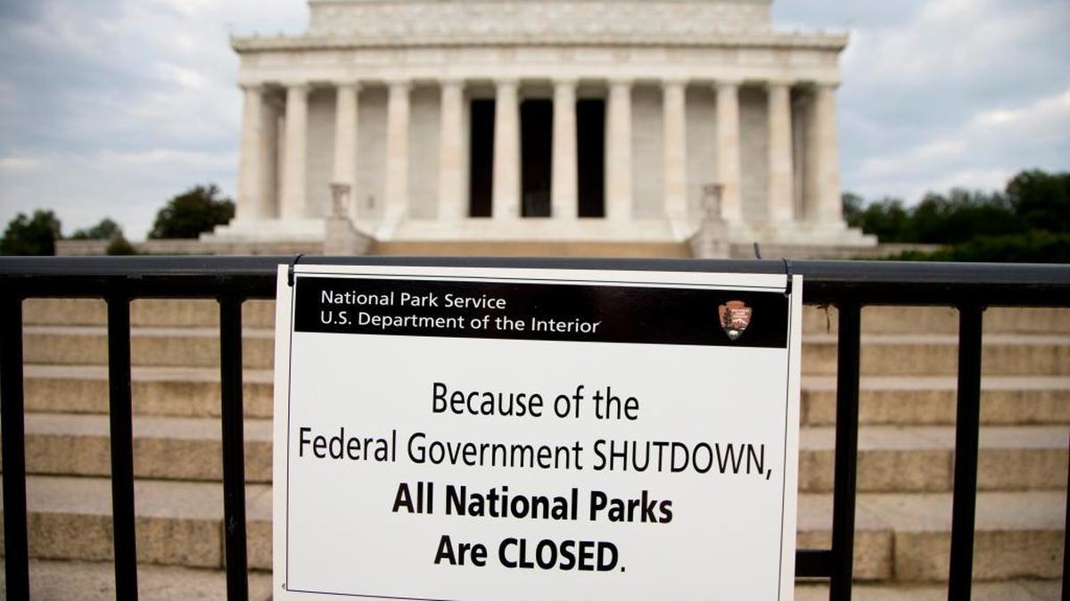 A sign noting the shutdown of all national parks is posted in front of the Lincoln Memorial in Washington on Oct. 1, 2013, the first day the last government shutdown. The 2013 shutdown lasted 17 days and forced 800,000 federal workers off the job. Another federal shutdown could occur late this week if Congress and the White House cannot resolve disputes over spending, immigration and other issues.