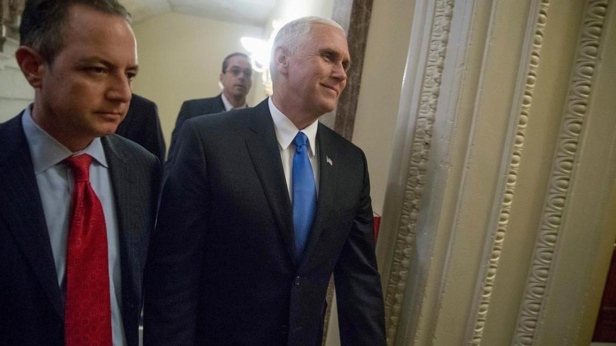 Vice President Mike Pence, center, and White House Chief of Staff Reince Priebus arrive on Capitol Hill in Washington for a health care legislation vote.