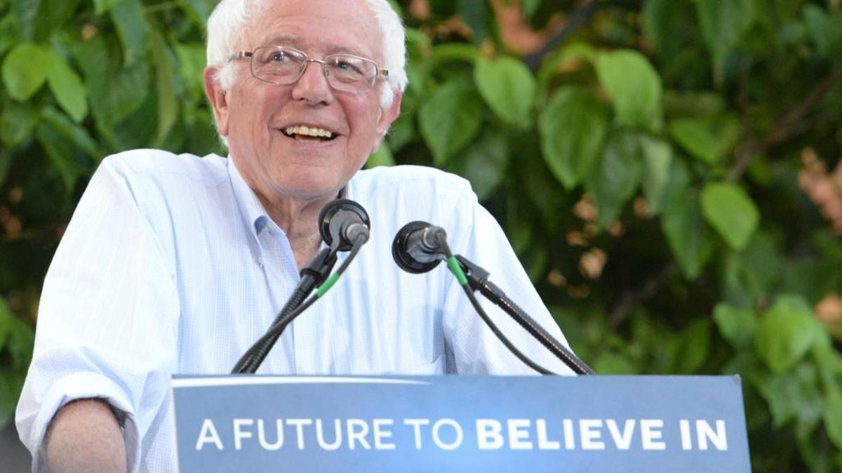 Democratic presidential candidate Sen. Bernie Sanders smiles as he begins to speak to a large crowd gathered on the California State University, Chico campus during a campaign rally stop Thursday in Chico, Calif.
