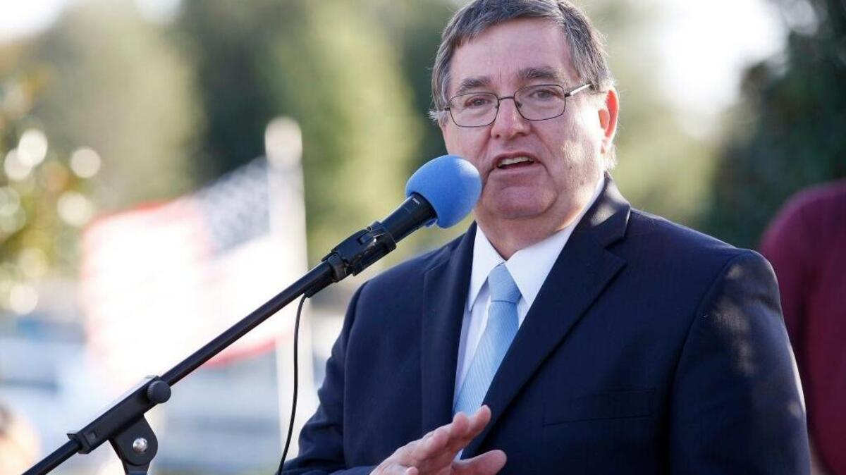 Congressman Michael Burgess speaks during a Veterans Day event at Independence Park in Trophy Club, Texas, on Nov. 11, 2015. Burgess is tasked with the legislation that could replace Barack Obama’s signature health care law.