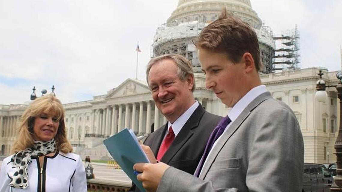 Republican Sen. Mike Crapo of Idaho, center, with Trevor Schaefer, right, and Schaefer’s mother, Charlie Smith, outside the U.S. Capitol on Wednesday, June 22, 2016.