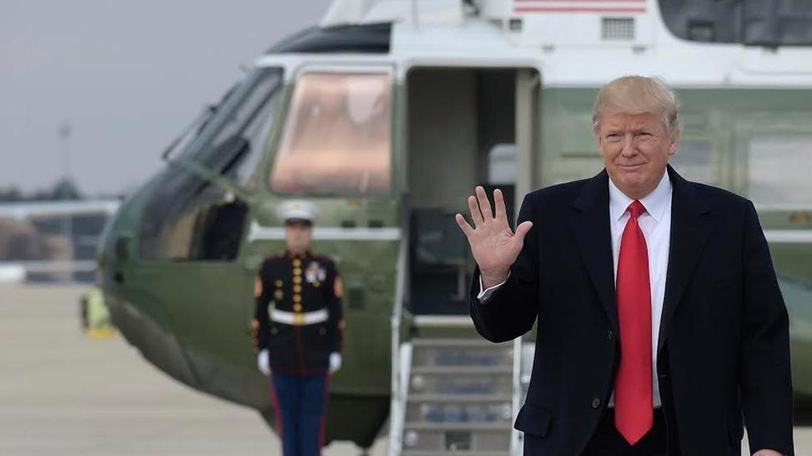 In this Feb. 3, 2017, file photo, President Donald Trump waves as he walks from Marine One to board Air Force One at Andrews Air Force Base, Md. Trump was heading to Florida to spend the weekend at Mar-a-Lago.