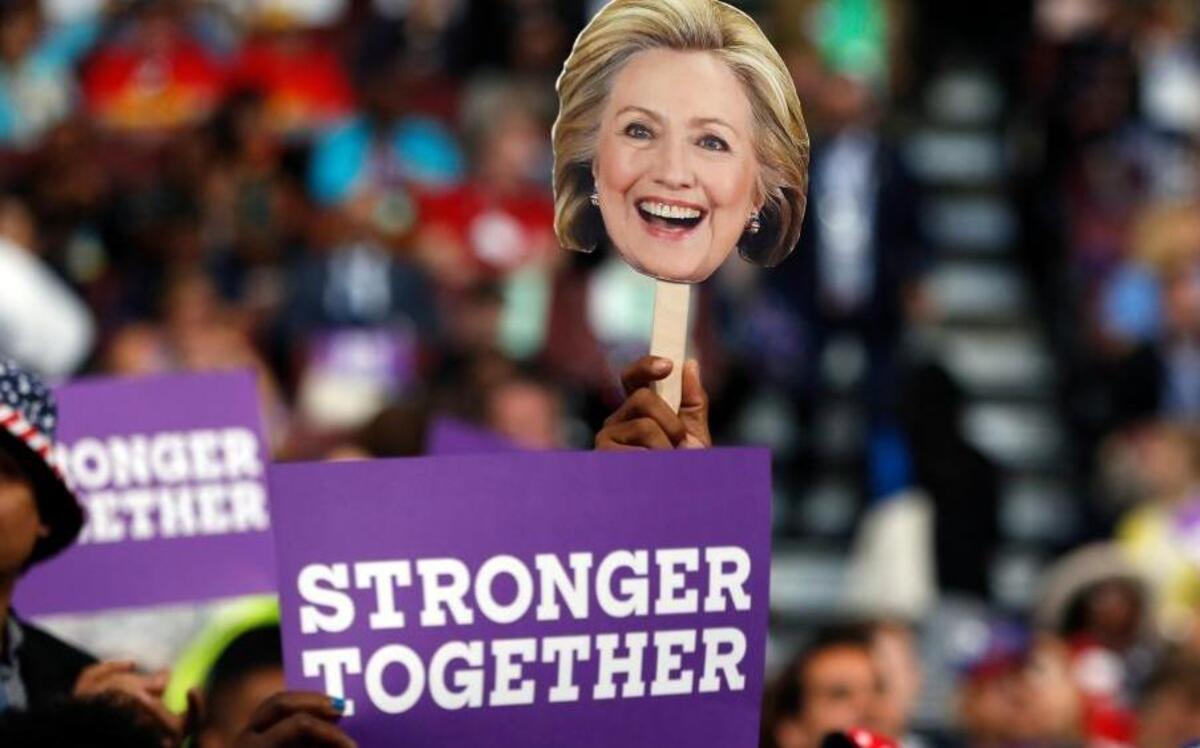 Delegates hold up signs to show their support for Democratic Presidential candidate Hillary Clinton during the third day session of the Democratic National Convention in Philadelphia, Wednesday, July 27, 2016.