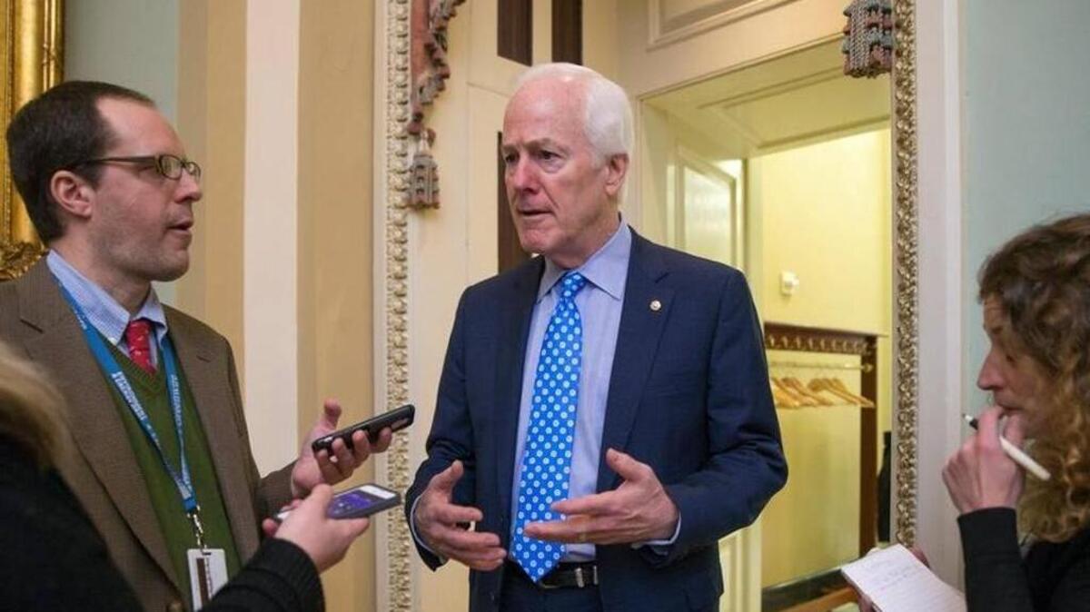 Senate Majority Whip John Cornyn of Texas, talks to reporters on Capitol Hill in Washington, Wednesday, Feb. 3, 2016, as he walks to a closed-door meeting with fellow Republicans during work on the energy reform bill. Cornyn voted in favor of Betsy DeVos as education secretary on Tuesday.