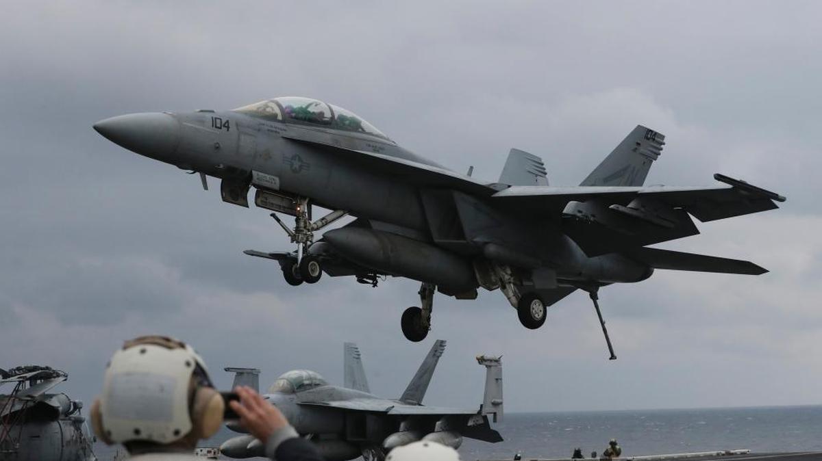 A U.S. Navy F/A-18 Super Hornet fighter approaching the USS Carl Vinson during joint military exercises with South Korea on Tuesday, March 14, 2017. A supplemental budget proposal for the remainder of this year asks for $13.5 billion to modernize military aircraft.