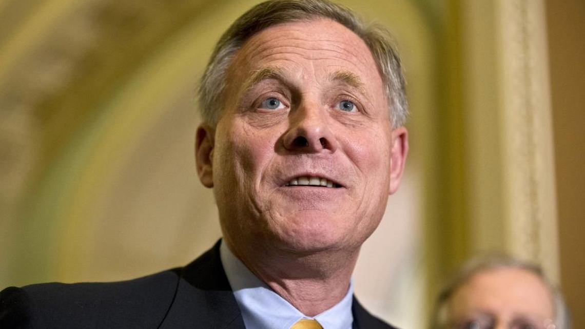 In this June 4, 2013, file photo, Sen. Richard Burr, R-N.C. speaks during a news conference on Capitol Hill in Washington. On Tuesday, Burr – chairman of the powerful U.S. Senate Intelligence Committee – said he thinks presumptive GOP presidential nominee Donald Trump is calling for a temporary “pause,” not a “ban,” on Muslims entering the country.