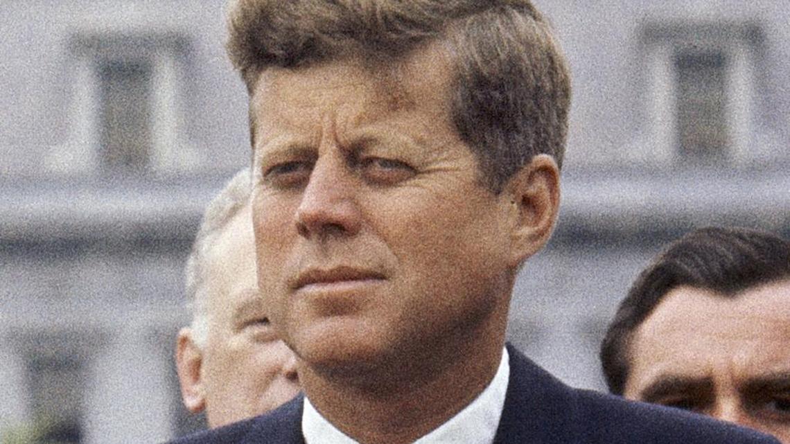 FILE - In this April 30, 1963 file photo, President John F. Kennedy listens while Grand Duchess Charlotte of Luxembourg speaks outside the White House in Washington. The National Archives has until Oct. 26, 2017, to disclose the remaining files related to Kennedy's Nov. 22, 1963 assassination, unless President Donald Trump intervenes.